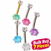 Five silver-toned curved barbell belly button piercings with faceted gemstones in mint green, pink, light blue, purple, and clear, arranged on a plain white background.