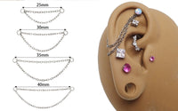 Double titanium add-on piercing chain from Body Clickers Body Jewelry, showing sleek, shiny titanium links on a jewelry display