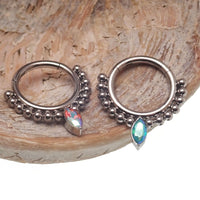 Titanium beaded teardrop clicker ring for septum piercing, 16g body jewelry by Body Clickers, with an 8mm diameter.