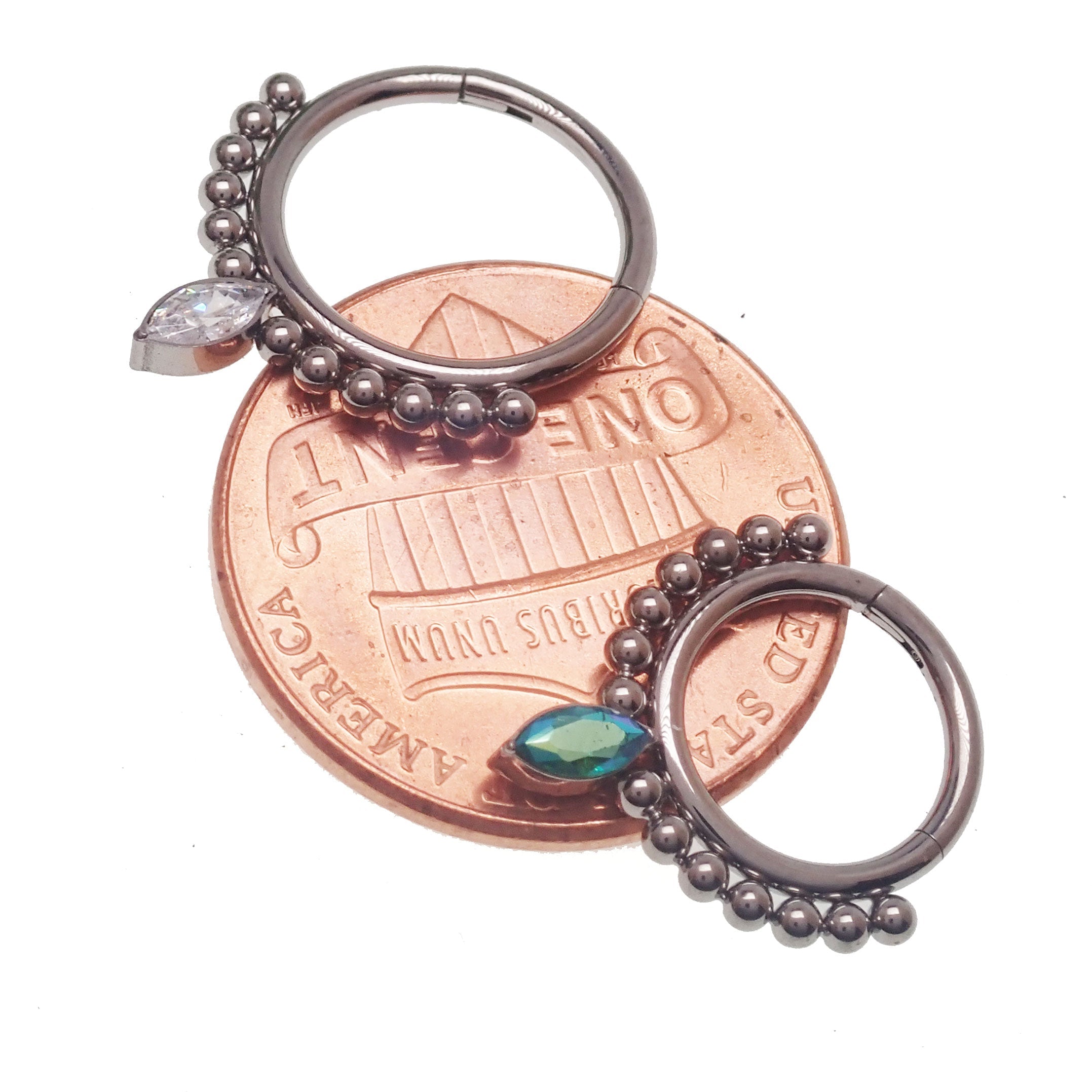 Beaded teardrop clicker ring in 16g body jewelry by Body Clickers, featuring intricate beaded design and teardrop shape.