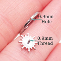 Implant grade titanium white opal sun hinge clicker body jewelry, 16g with 8mm or 10mm diameter piercing.