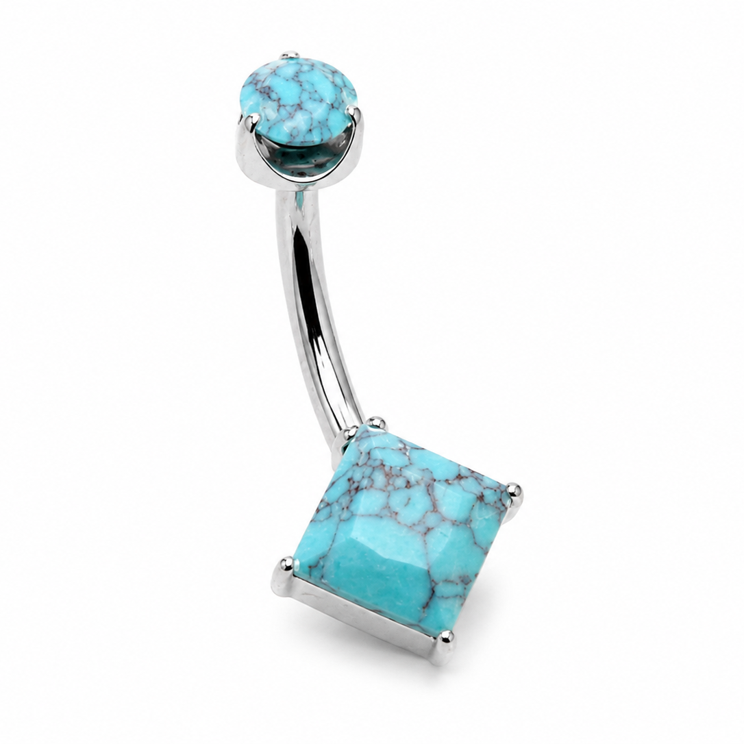 A silver-toned curved barbell belly button ring featuring a round turquoise stone on the top curve and a larger square turquoise stone on the bottom curve, set against a plain white background.